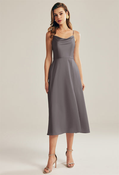 A woman wearing a Renee - Satin Charmeuse Bridesmaid Dress - Off the Rack by Bergamot Bridal in London.