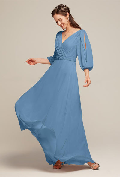 The bridesmaid is wearing a blue Polly - Chiffon Bridesmaid Dress - Off the Rack from Bergamot Bridal in London.