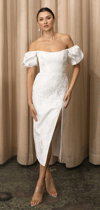 The model is wearing a Marilyn - Jenny Yoo Little White Dress by Bergamot Bridal.