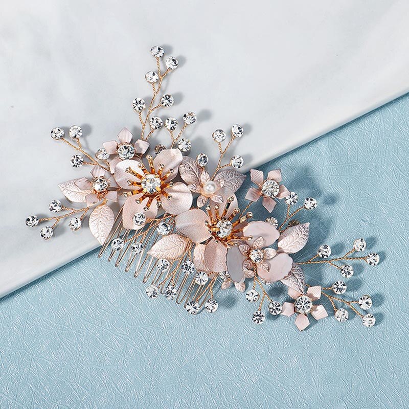 A Rose Gold Floral Haircomb with crystals, perfect for Bergamot Bridal shops.