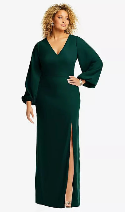 A person elegantly posed in the Dessy Collection's Long Puff Sleeve V-Neck Trumpet Bridesmaid Dress by Bergamot Bridal, a dark green crepe maxi with a V-neckline and side slit, against a plain background.