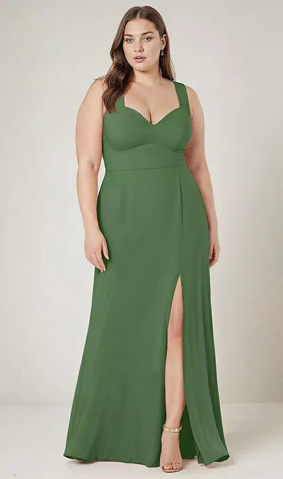 A woman in the Bergamot Bridal Contoured Wide Strap Sweetheart Maxi Dress—After Six · Style 1558, a green sleeveless chiffon dress featuring a thigh-high slit and sweetheart neckline, stands facing forward on heels against a plain background.