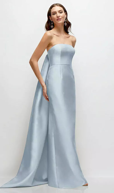 A woman elegantly wears Bergamot Bridal's Alfred Sung Lee Style D876, a strapless satin column bridesmaid dress with a removable Watteau train, set against a plain background.