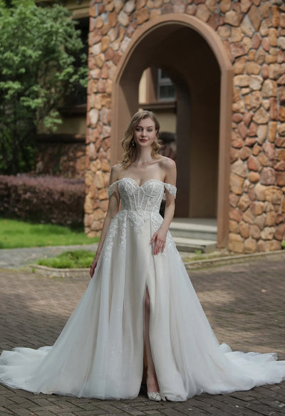 Bergamot Bridal's Tulle Off-The-Shoulder Sweetheart Lace Ball Gown With Slit and Detachable Long Sleeves wedding dress.