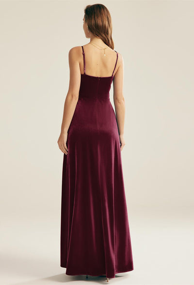 The back view of a woman wearing a Leeward - Velvet Bridesmaid Dress - Off The Rack by Bergamot Bridal is perfect for those searching for bridesmaid dresses in London.