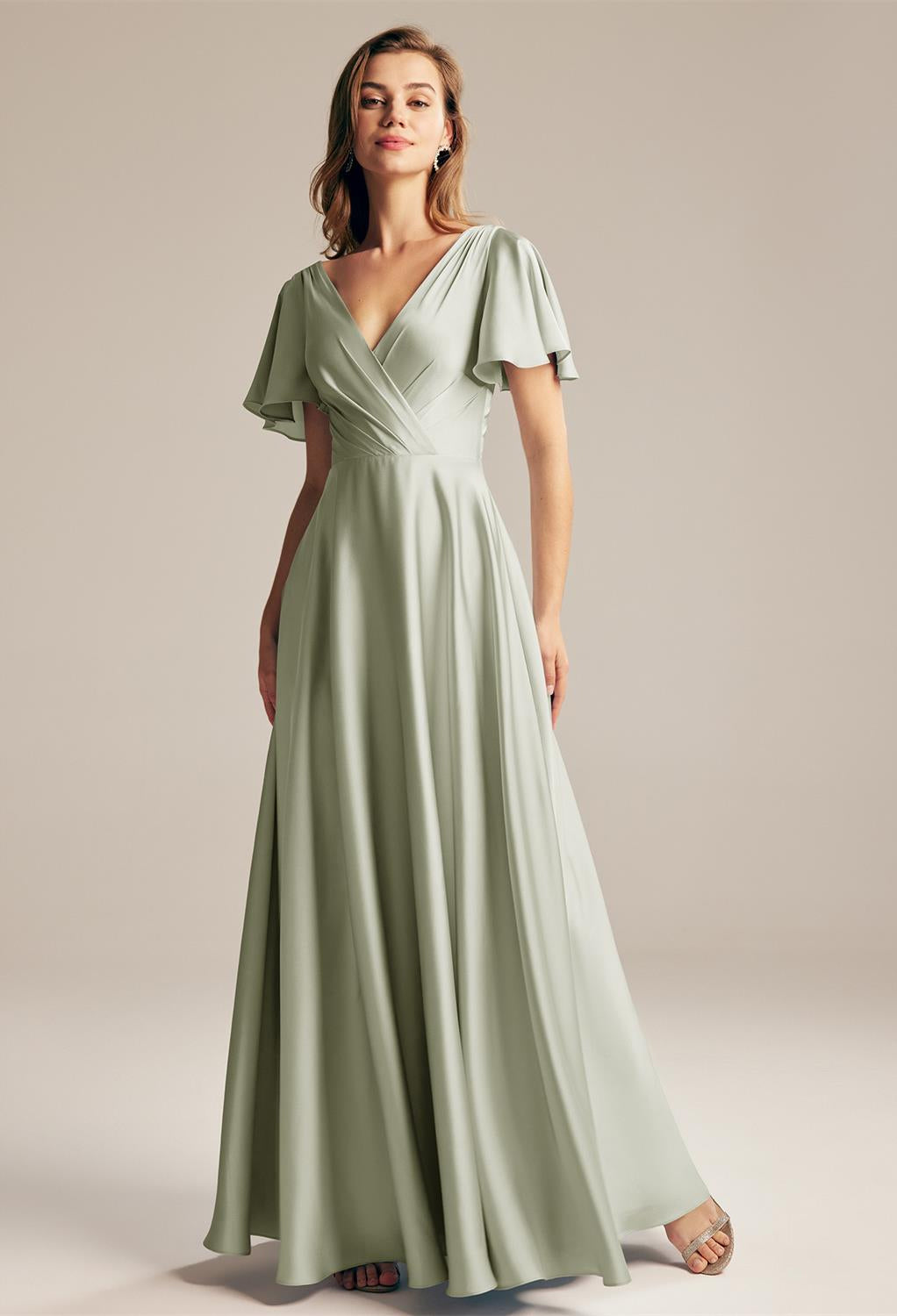 The bridesmaid is wearing a Furst - Satin Charmeuse Bridesmaid Dress - Off The Rack purchased from Bergamot Bridal.
