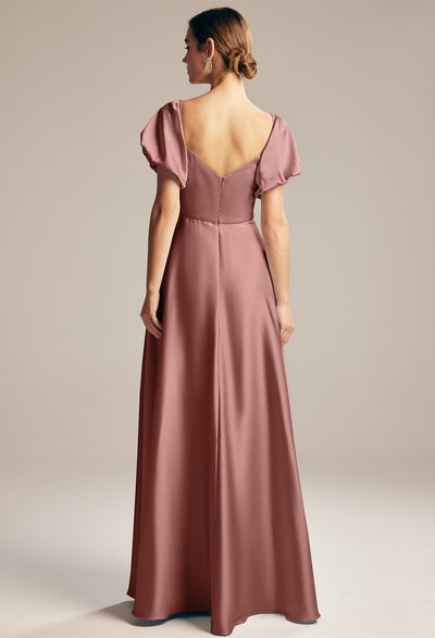 The back view of a Dey - Satin Charmeuse Bridesmaid Dress - Off The Rack at Bergamot Bridal bridal shop.