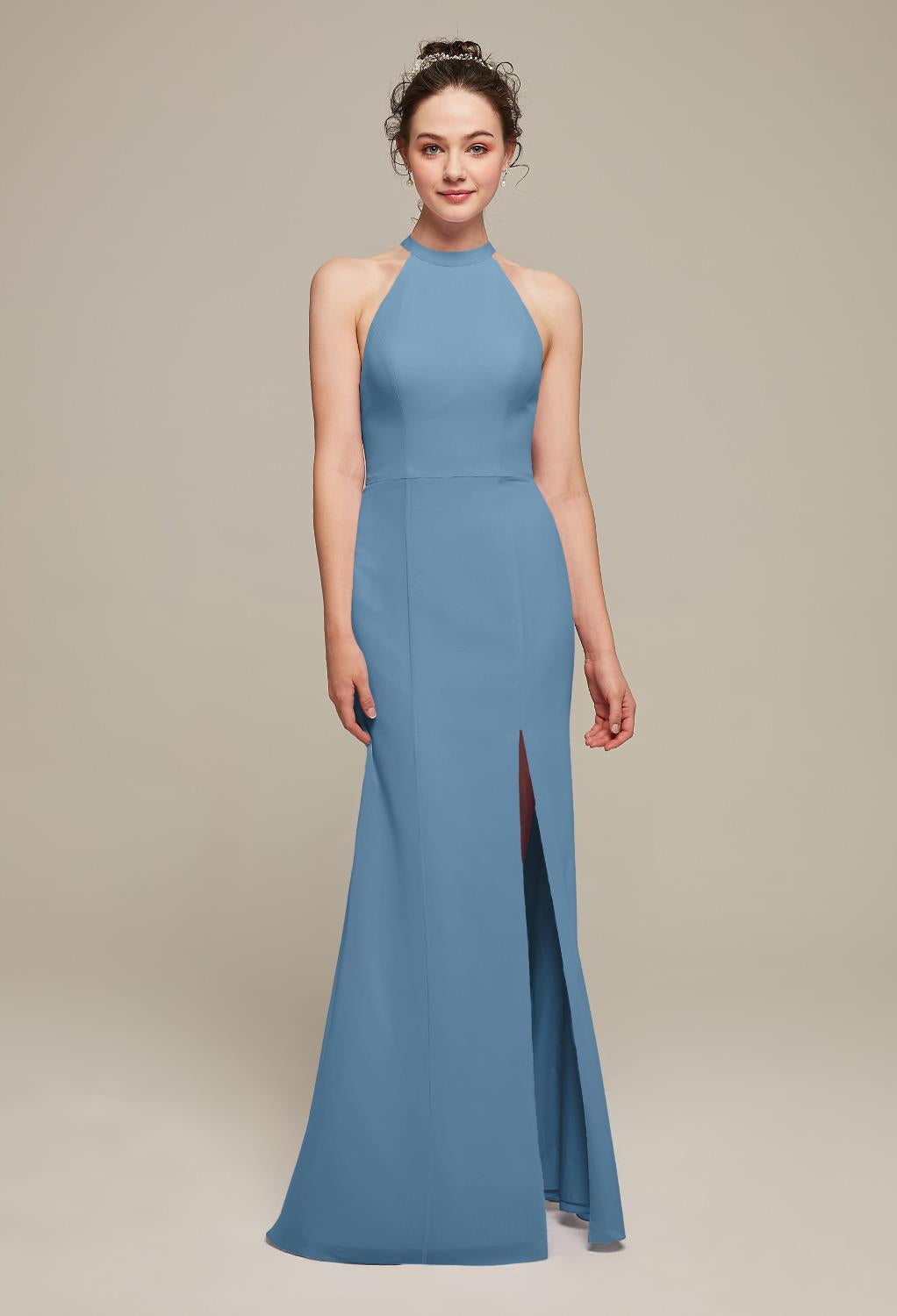 A bridesmaid in a blue gown with a high slit found the Ailsa - Chiffon Bridesmaid Dress - Off The Rack at Bergamot Bridal.