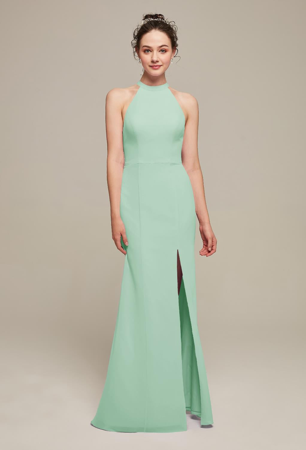 A bridesmaid in a Ailsa - Chiffon Bridesmaid Dress - Off The Rack gown with a slit found at Bergamot Bridal.