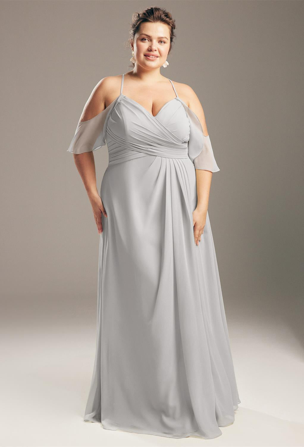 A plus size bridesmaid in a Jenifer - Chiffon Bridesmaid Dress - Off the Rack by Bergamot Bridal.
