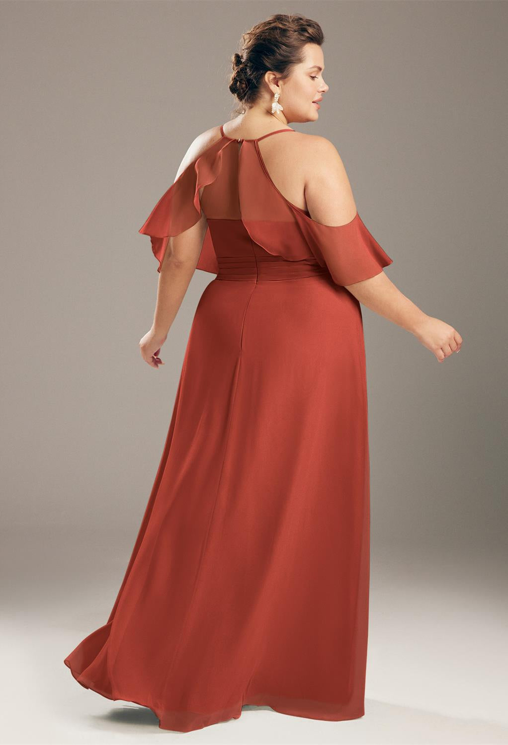 The back of a Jenifer - Chiffon Bridesmaid Dress - Off the Rack in a red dress at Bergamot Bridal in London.