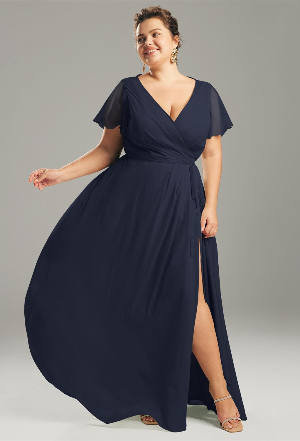 An Ellison - Chiffon Bridesmaid Dress - Off The Rack with a v-neck and slit is available at Bergamot Bridal shops in London.