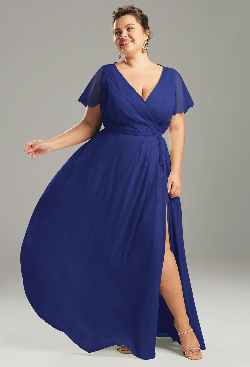 An Ellison - Chiffon Bridesmaid Dress - Off The Rack available at Bergamot Bridal, a bridal shop in London, with a v-neck and slit.