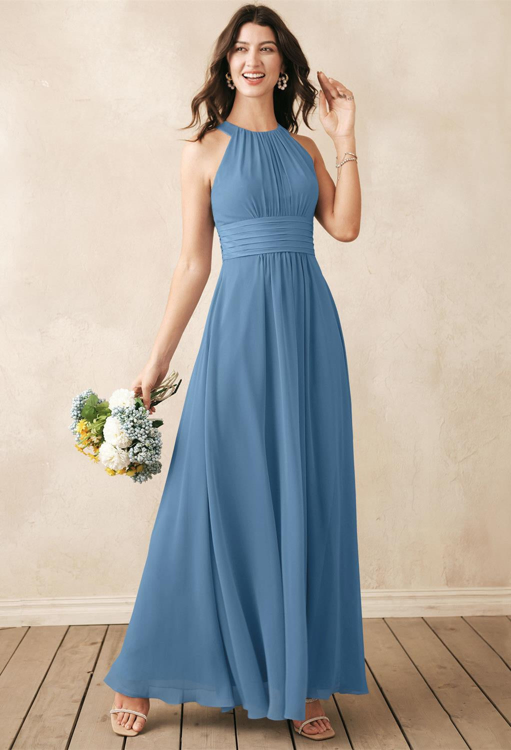 A bridesmaid in a blue Dorian - Chiffon Bridesmaid Dress - Off the Rack from Bergamot Bridal.