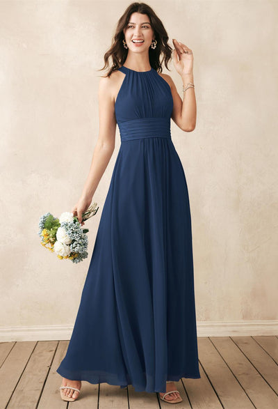 A bridesmaid in a navy blue Dorian - Chiffon Bridesmaid Dress - Off the Rack from Bergamot Bridal.