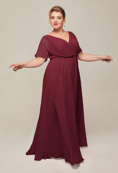 A plus size Ginny - Chiffon Bridesmaid Dress - Off The Rack with a v-neck is available at Bergamot Bridal.