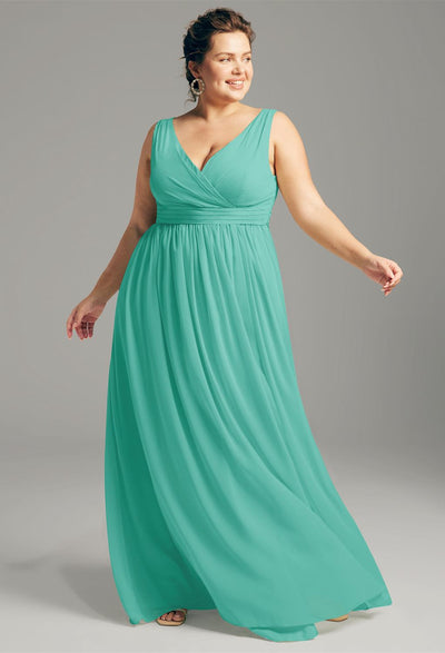 A bridesmaid in a Turquoise Hilaria Chiffon Bridesmaid Dress - Off the Rack purchased at Bergamot Bridal.
