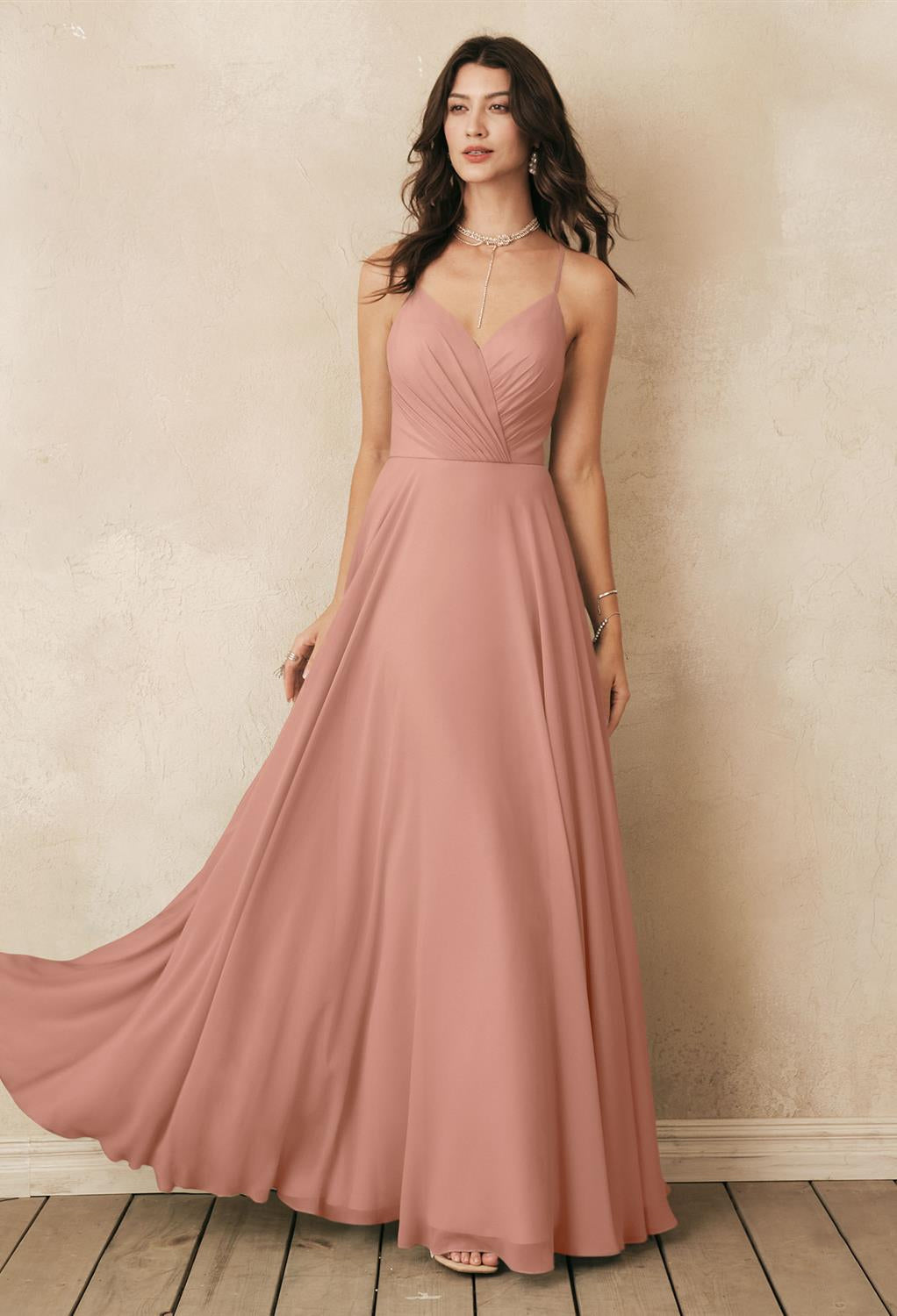 The bridesmaid is wearing a Melody - Chiffon Bridesmaid Dress - Off the Rack purchased from Bergamot Bridal in London.