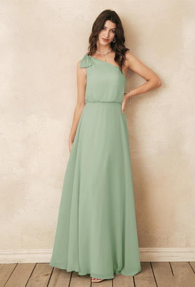 A woman wearing a Robina - Chiffon Bridesmaid Dress - Off The Rack by Bergamot Bridal.