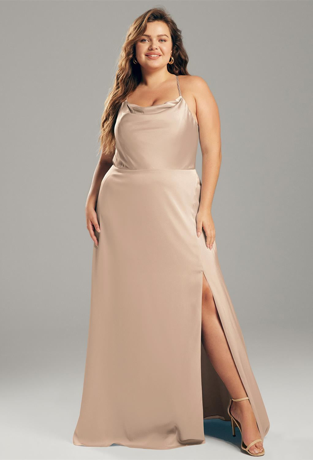 A plus size woman in a Kora - Satin Charmeuse Bridesmaid Dress - Off The Rack from Bergamot Bridal.