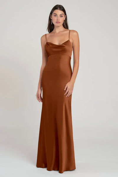 Woman in a long, brown satin Addison - Bridesmaid Dress by Jenny Yoo from Bergamot Bridal.