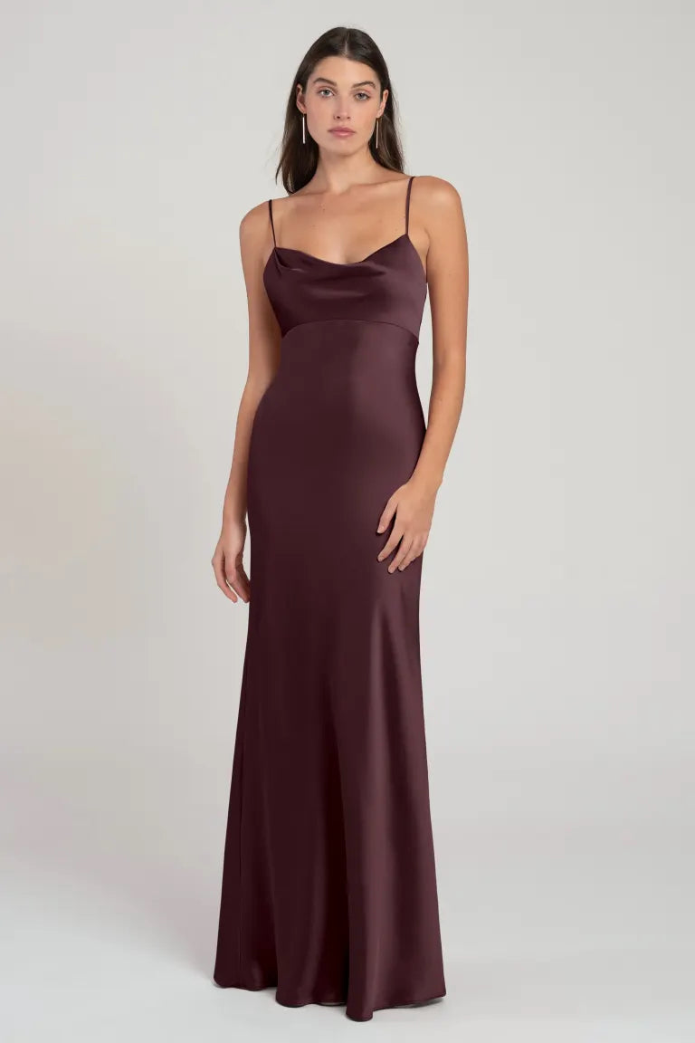 Woman in a maroon satin slip evening gown.
Product Name: Addison - Bridesmaid Dress by Jenny Yoo
Brand Name: Bergamot Bridal