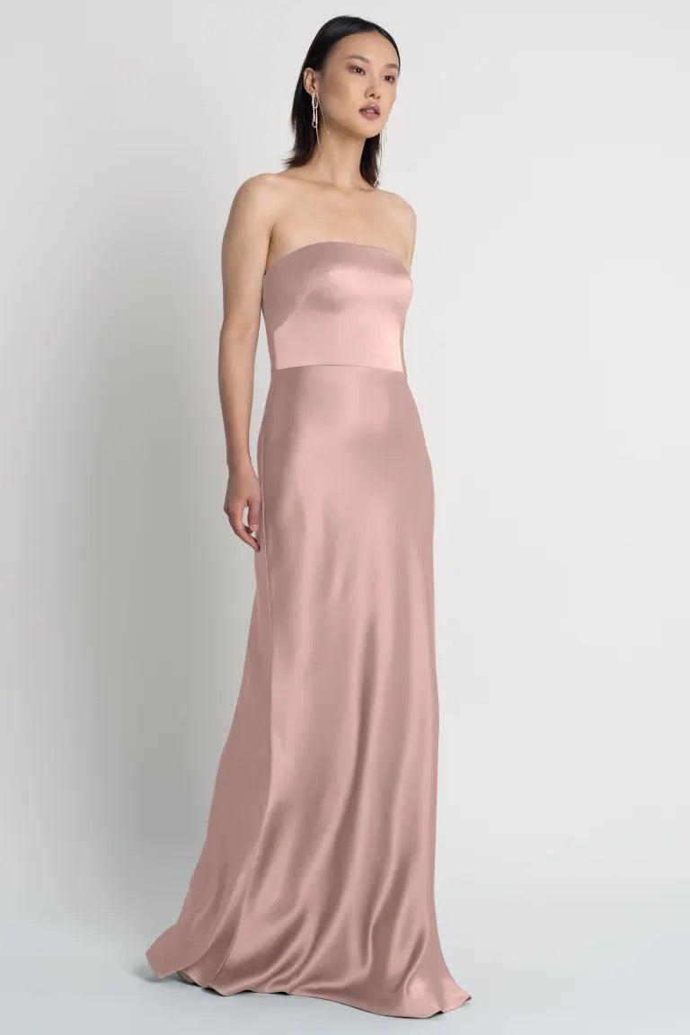 Woman in a Melody - Bridesmaid Dress by Jenny Yoo satin dress with a strapless neckline from Bergamot Bridal.