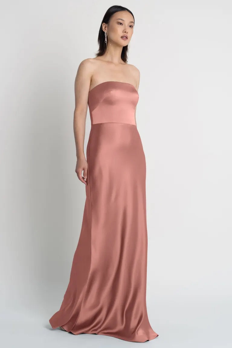 Woman in an elegant Melody - Bridesmaid Dress by Jenny Yoo gown from Bergamot Bridal.