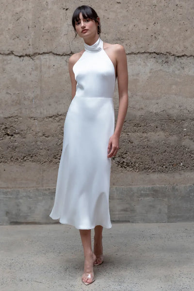 A model wearing a Nicolette - Jenny Yoo Little White Dress by Bergamot Bridal.
