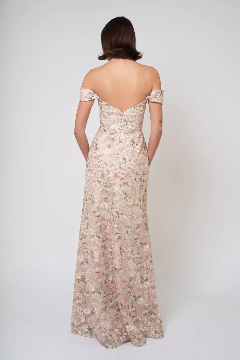 Woman in a Jenny Yoo Bridesmaid Dress with Ophelia embroidery, viewed from the back, offered by Bergamot Bridal.