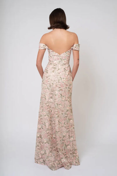 Woman in a Jenny Yoo Bridesmaid Dress with Ophelia embroidery, viewed from the back, offered by Bergamot Bridal.