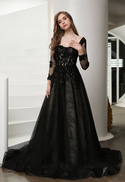 Bergamot Bridal's Black Illusion Lace Wedding Dress with Detachable Long Sleeves features lace appliques.