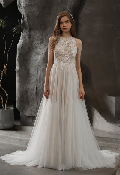 The bride is wearing a High Neck A-line Wedding Gown with Sequined Lace by Bergamot Bridal.