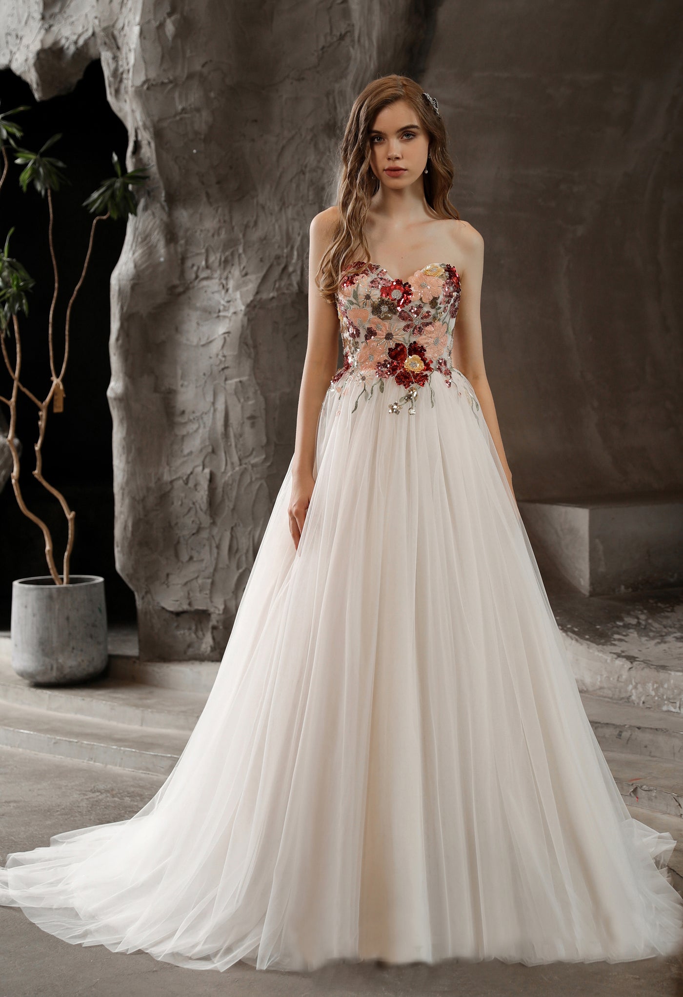 A beautiful Strapless Princess A-line bridal gown with tulle skirt and floral beaded bodice can be found at Bergamot Bridal shops in London.