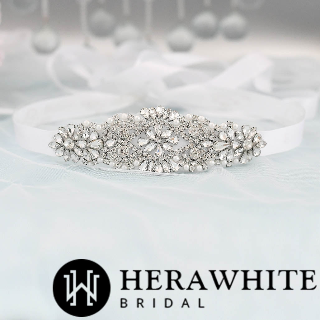 The Glittering Rhinestones Pearl Bridal Sash by Bergamot Bridal can be found at bridal shops in London.