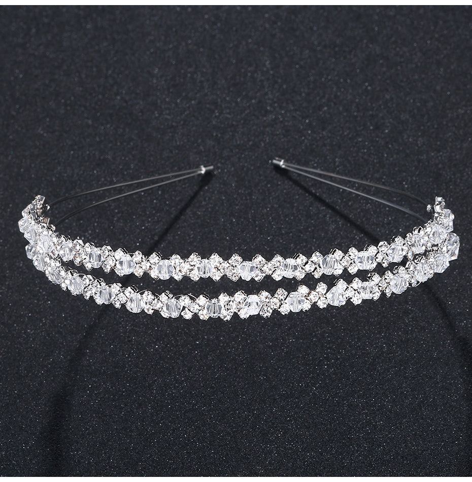 A Silver Double Crystal Bridal Hairband by Bergamot Bridal can be found at bridal shops.