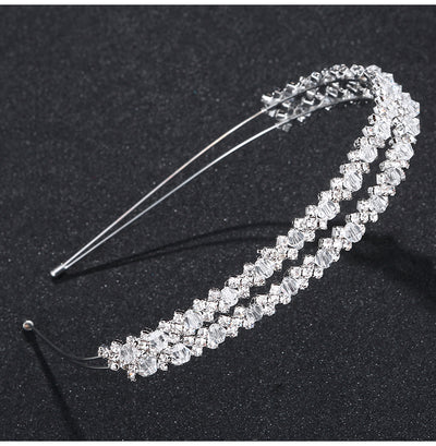 A Double Crystal Bridal Hairband with crystals on it that can be found at Bergamot Bridal shops.