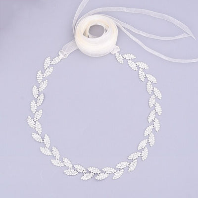 Silver leaf crystal bridal belt sash by Bergamot Bridal available at bridal shops.