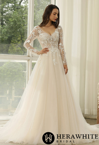 Bergamot Bridal Long Sleeve Ballgown Boho Bridal Gowns are available at a bridal shop in London.