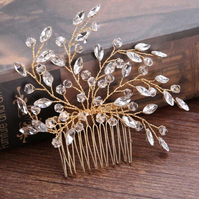 A Gold Crystal Vine Fan Hair Comb from Bergamot Bridal is available at bridal shops.