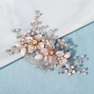 A Rose Gold Floral Haircomb with crystals, perfect for Bergamot Bridal shops.